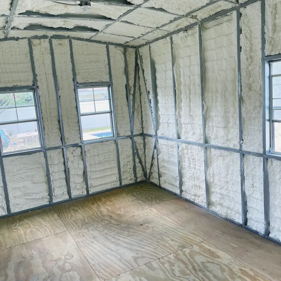 Closed-cell spray foam insulation applied to wall cavities in a residential project in Belleview